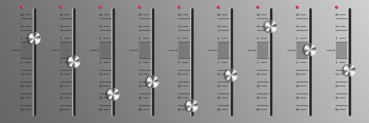 An intricate sound mixer featuring numerous knobs, each designed for precise audio control and adjustment