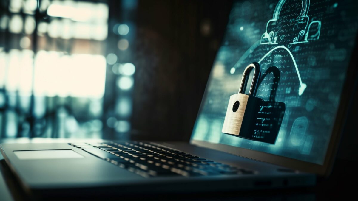 A laptop screen displaying a padlock, symbolizing data protection against cyberattacks and enhancing digital security.